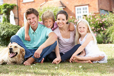 Family with house and dog